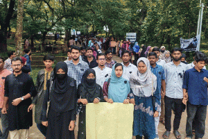 অপ্রতিম হত্যার বিচার দাবিতে কুবিতে মৌন মিছিল